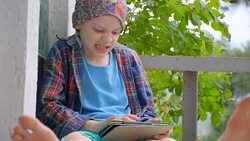 boy and videogames on the digital tablet Stock Footage