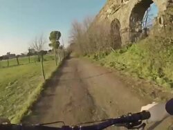 Mountain Bike on the Via Appia Antica and Aqueduct Stock Footage