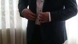 Man zipping up Stock Footage