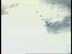 CONGO: FRENCH PARATROOPERS LET CONGLESE PARACUTE REGIMENT JUMP News Clip