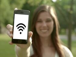 Young woman smart phone with wifi in the park Stock Footage