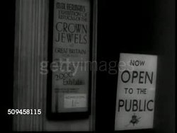 1936: CORONATION FEVER: Sign 'All Coronation Seats Sold'  Sign for exhibit of replicas of Crown Jewels. Women standing in front of case looking at copies of Crown Jewels. WS Case w/ Crown, jewelry. CU British Imperial State Crown (copy) in case. Instructional Video