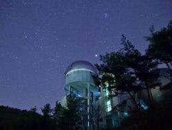 WS T/L View of stars diurnal motion and astronomical observatory / Chungcheongbuk-do, Norway Stock Footage