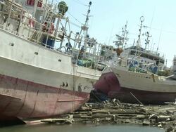 Destruction in Kesennuma City, a traditional fishing town in N E Japan filmed on 1 April 2011, 3 weeks after a tsunami which was caused by magnitude 9 Tohoku earthquake off north east Japan / AUDIO Stock Footage