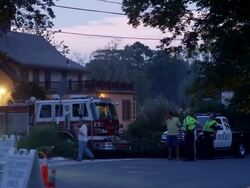 police car and fire truck in suburbs Stock Footage