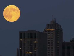 Moon Rising in the Manhattan Sky Stock Footage