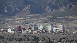 Colorado Springs city skyscrapers coal power plant Pikes Peak Stock Footage