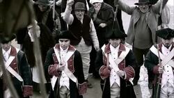 Villagers chant as French soldiers stand guard. Stock Footage