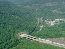 WS AERIAL DS ZI View of Cumberland Gap Tunnel on route 25E / Tennessee, United States Stock Footage