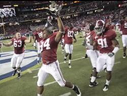 Alabama knocks off top-ranked Florida in the SEC title game;  Texas eeks out win over Nebraska for the Big 12 title;  Cincinnati rallies to edge Pittsburgh in Big East showdown (Dec. 6) News Clip