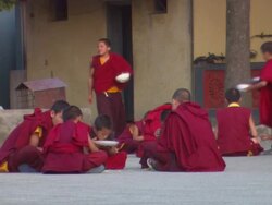 WS Boys eating food near Buddhist monasteries / Kathmandu, Central Region,Nepal Stock Footage