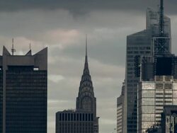 Time Lapse of clouds rushing by the Chrysler Building. Stock Footage