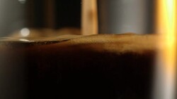 Pouring coffee. Mixing layers Stock Footage