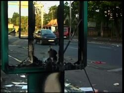 Aftermath of clashes on tense island News Clip