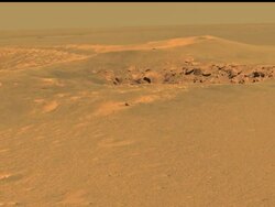 Mars rover Opportunity, which reached the edge of a deep and geologically rich crater last week after a marathon trek. News Clip