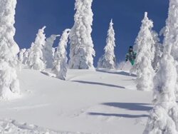 A man skiing down a snow-covered mountain in the winter. - Slow Motion - 1920x1080 - filmed at 240 fps Stock Footage
