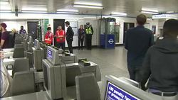 Commuters Passing Through Ticket Barriers News Clip