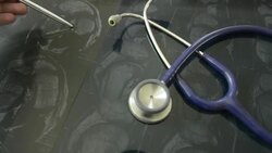 Doctor reading MRI film result Stock Footage