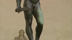 A sculpture of Perseus and Medusa stands on a pedestal. Stock Footage