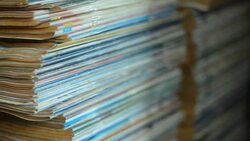 paning down : old book heap edge Stock Footage