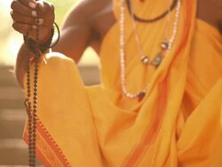 Sage with prayer beads, Faridabad, Haryana, India Stock Footage