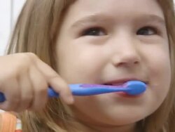 Little girl brushing her teeth (HD) Stock Footage