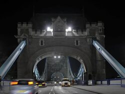 T/L WS Tower Bridge London with traffic at night Stock Footage