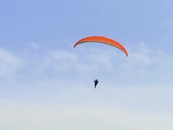Paraglider in Clouds Stock Footage