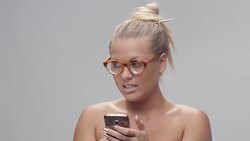 Young Beautiful Woman Whispered A Secret To A Friend On the Mobile Phone And Making Faces Stock Footage