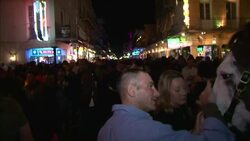 Crowds of celebrants fill Bourbon Street in New Orleans. Stock Footage