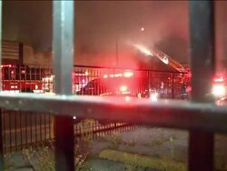 Firemen At Scene Of Grocery Store Fire Stock Footage