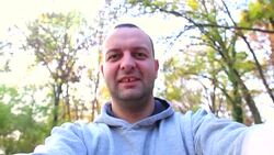 man taking a selfie in the park Stock Footage