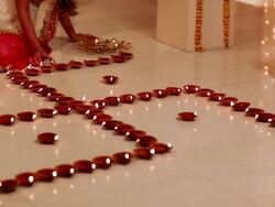 Young woman burning oil lamp in diwali festival  Stock Footage
