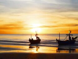 HD:Sunrise scene with silhouette boat.(timelapse) Stock Footage
