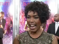 INTERVIEW - Angela Bassett talks about having the Black Nativity premiere at the Apollo home of Langston Hughes, She talks about her role and singing and starring along side Jennifer Hudson and Forrest Whitaker Stock Footage