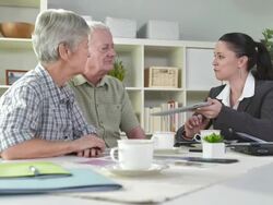 HD DOLLY: Explaining Financial Plan While Using A Tablet Computer Stock Footage