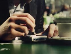 CU, business man writing on mobile phone in cafe, Ljubljana, Slovenia Stock Footage