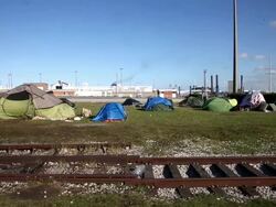Migrants Gather At Calais Border Pressure Point Stock Footage
