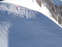 WS AERIAL TS View of paramotor flying over the summit of the mont blanc / chamonix, Haut savoir, france  Stock Footage
