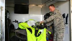 Bossier City, Louisiana Military Varksdale Air Fouce Base All Hazard Response Team AF officier checking equipment for HMR or Hazardous Materials Response Stock Footage