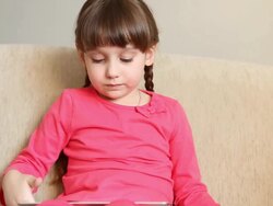 Digital Tablet and Girl (HD) Stock Footage