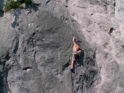 HD CRANE: Man Climbing Stock Footage