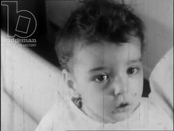 Maternal deprivation with young children, c.1950 part 2 - children withrawn from outside world, behavioural problems Stock Footage