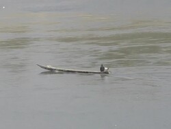 Fisherman in boat at Mekong river Stock Footage