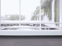  WS Businessmen running through lobby of building, one pulling a rolling briefcase and one carrying papers / Seattle, Washington, United States Stock Footage