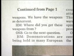 Shots of newspaper reporting that bin Laden has atomic weapons News Clip