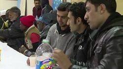 CLEAN : Migrants stream out of Calais Jungle before demolition News Clip