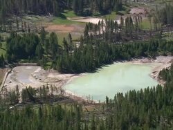 MS AERIAL ZI Shot of hot spring near lake of Yellowstone River / Wyoming, United States Stock Footage