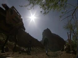 Two men walking down path in mountains with donkey (Equus assinus), Alamut, Iran (sound available) Stock Footage