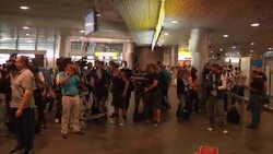 World's media await arrival of former NSA contractor from Hong Kong Instructional Video